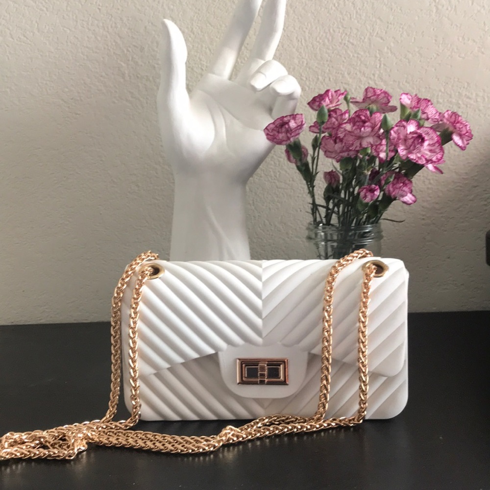 White and gold plastic purse bag